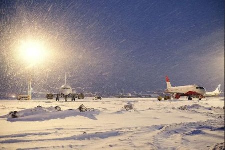 В США из-за сильной снежной бури отменили более тысячи авиарейсов