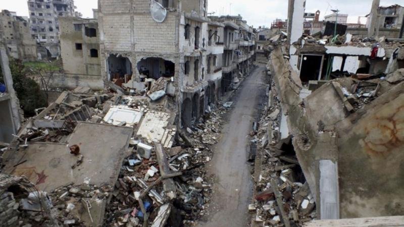 Suriyada yaşayış binası uçdu: ölənlər var