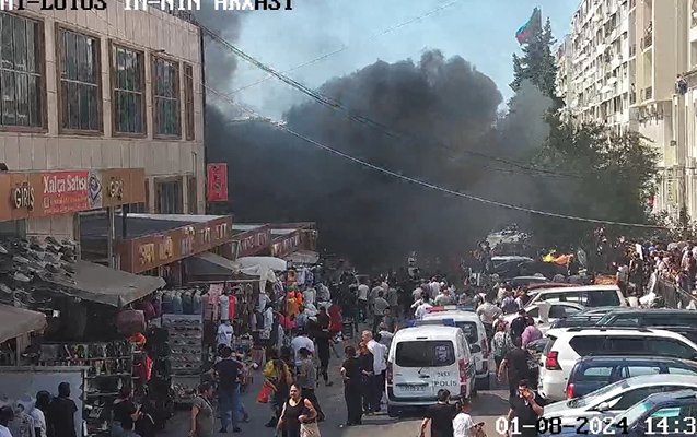 Bakıda ticarət mərkəzi yanır - Fotolar - Yenilənir